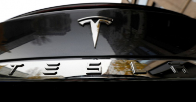 Electrifying Volatility: Tesla Stock Plummets to 15-Month Low Ahead of Earnings Report