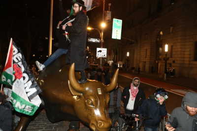 Controversy Strikes: 'Death to Israel' Graffiti Appears on NYC's 'Charging Bull' Statue Amid Protest
